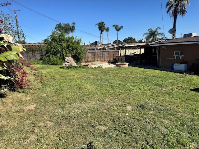 1113 Brewster Dr, Pomona, CA 91767 - view of yard featuring a patio and a fenced backyard