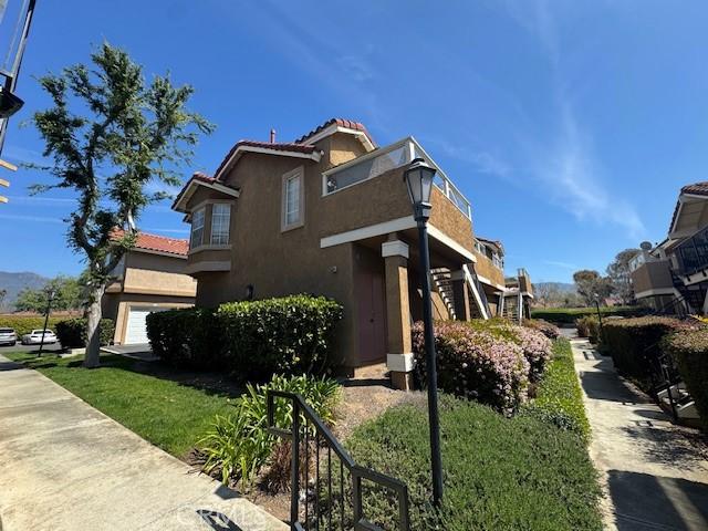 2 Via Pariente, Rancho Santa Margarita, CA 92688 - view of front of property featuring stucco siding and a tiled roof