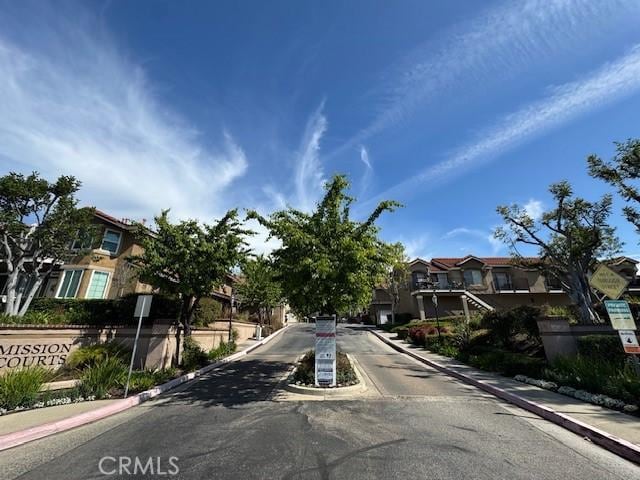 2 Via Pariente, Rancho Santa Margarita, CA 92688 - view of asphalt street featuring curbs, sidewalks, and a residential view