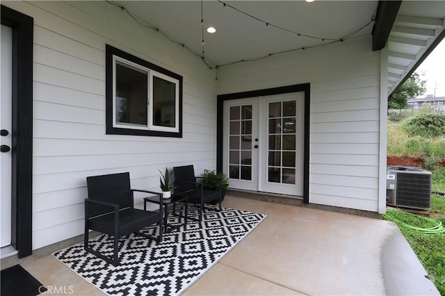 view of patio / terrace featuring central air condition unit and french doors