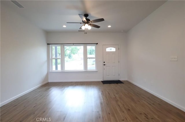 interior space featuring baseboards, recessed lighting, ceiling fan, and dark wood-style flooring