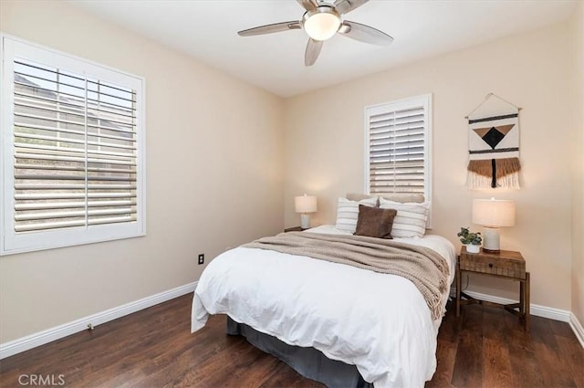 bedroom featuring wood finished floors, ceiling fan, and baseboards