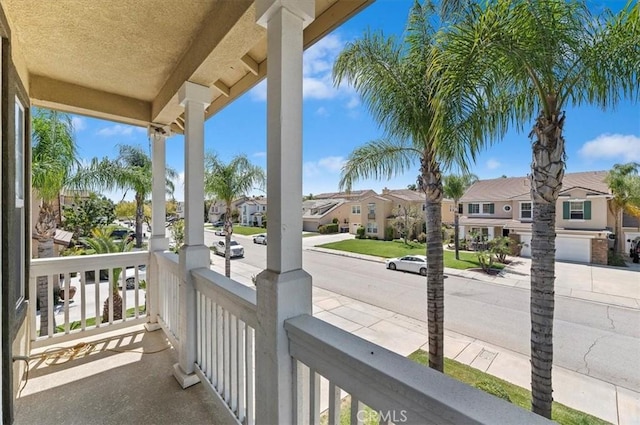 balcony featuring a residential view