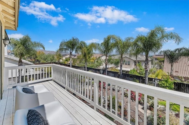 wooden deck featuring a residential view