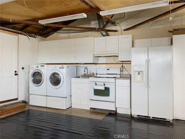 laundry room featuring washer and dryer, laundry area, and a sink