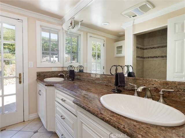 full bath with visible vents, a sink, and plenty of natural light