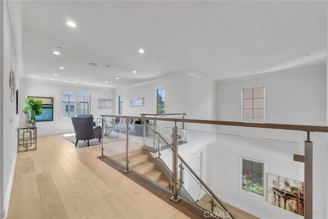 63 Poncho, Irvine, CA 92602 - stairway featuring wood finished floors, recessed lighting, crown molding, and baseboards