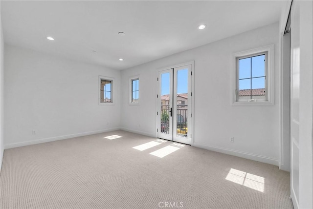 63 Poncho, Irvine, CA 92602 - empty room with baseboards, light colored carpet, and recessed lighting