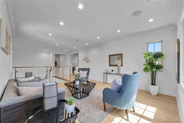 63 Poncho, Irvine, CA 92602 - living area featuring light wood-style floors, recessed lighting, crown molding, and baseboards
