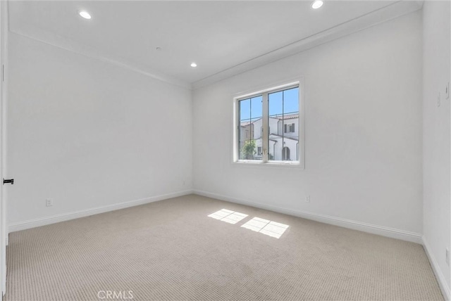 63 Poncho, Irvine, CA 92602 - empty room featuring light colored carpet, baseboards, and recessed lighting