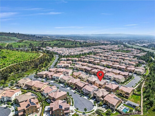 63 Poncho, Irvine, CA 92602 - aerial view of property and surrounding area featuring nearby suburban area