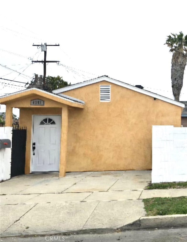 view of front of home with stucco siding
