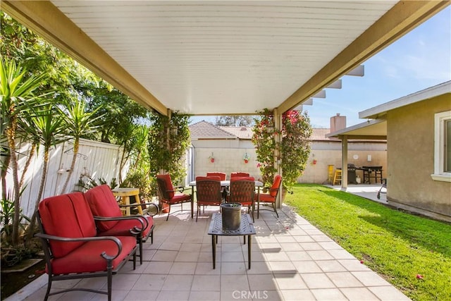 10517 50th St, Jurupa Valley, CA 91752 - view of patio / terrace featuring a fenced backyard and outdoor dining area