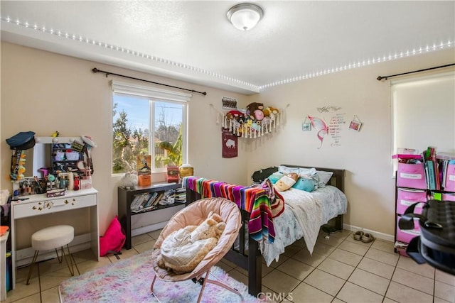 10517 50th St, Jurupa Valley, CA 91752 - bedroom with baseboards and tile patterned flooring