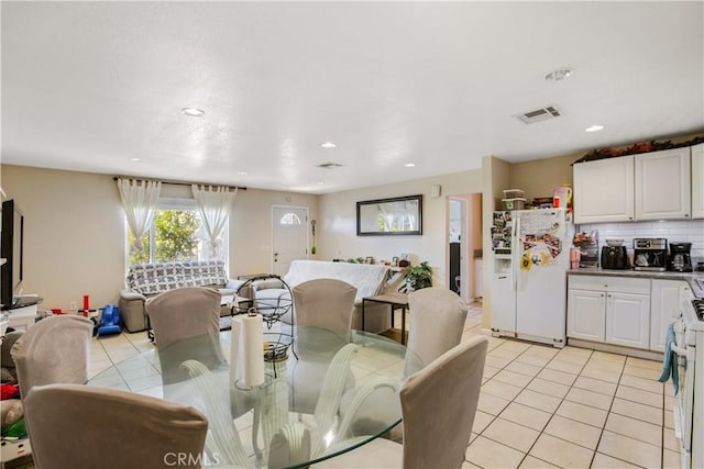 10517 50th St, Jurupa Valley, CA 91752 - dining space featuring recessed lighting, light tile patterned floors, and visible vents