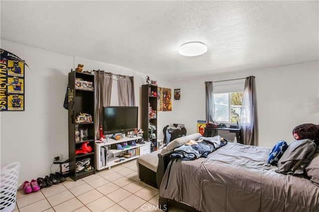 10517 50th St, Jurupa Valley, CA 91752 - bedroom with a textured ceiling and light tile patterned floors