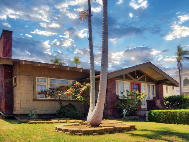 view of front of home with a front yard