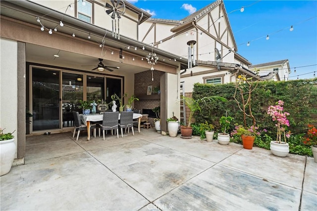view of patio / terrace with a ceiling fan and outdoor dining space