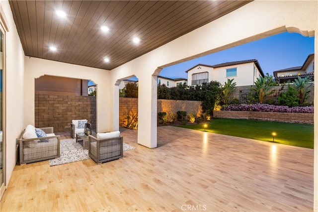 view of patio / terrace with a fenced backyard, a deck, and an outdoor hangout area