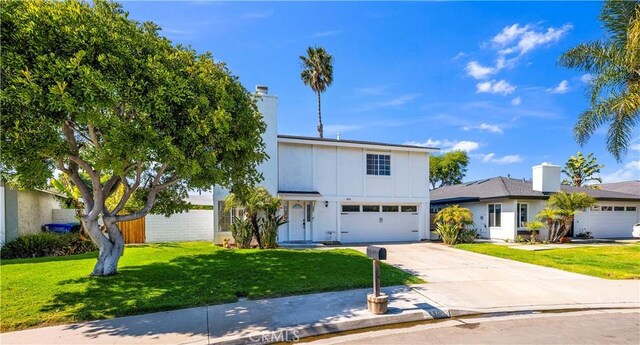 450 Anchor Way, Carlsbad, CA 92008 - traditional-style house with driveway, board and batten siding, a front yard, and a garage
