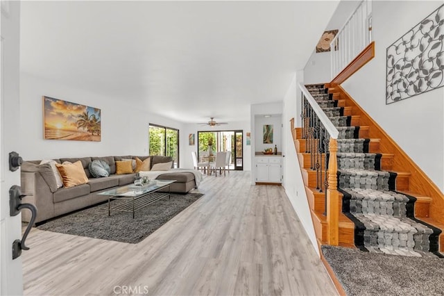 450 Anchor Way, Carlsbad, CA 92008 - living area featuring light wood-style floors, stairway, and a ceiling fan