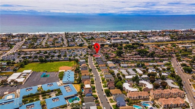 bird's eye view with a residential view and a water view