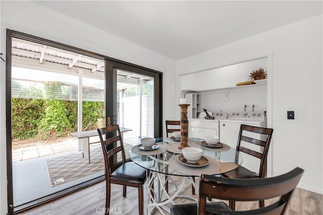 450 Anchor Way, Carlsbad, CA 92008 - dining space with separate washer and dryer and light wood finished floors