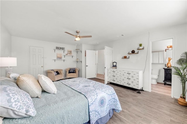 bedroom with baseboards, a ceiling fan, and light wood finished floors
