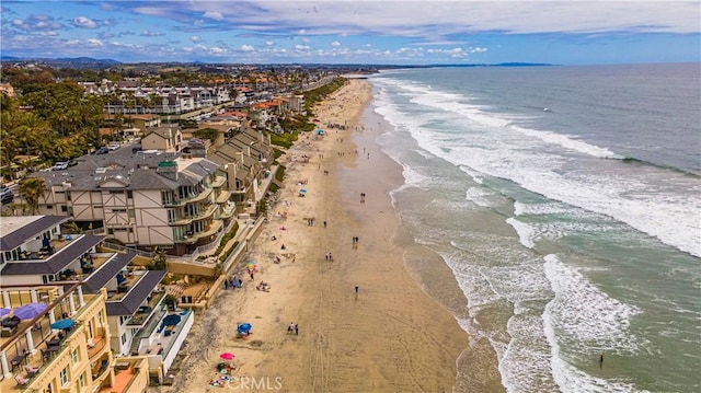 aerial view with a beach view and a water view