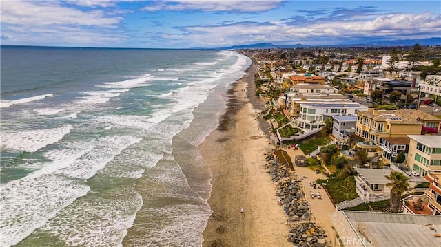 aerial view featuring a water view and a view of the beach