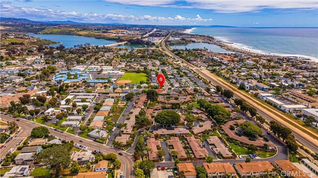 aerial view with a water view and a residential view