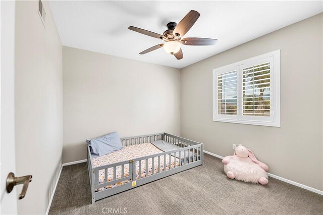 43273 Modena Dr, Temecula, CA 92592 - unfurnished bedroom featuring ceiling fan, baseboards, visible vents, and carpet floors