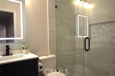 1260 S Pennsylvania, Glendora, CA 91740 - bathroom with vanity, a shower stall, and toilet