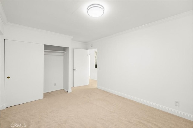 19 Alameda, Irvine, CA 92620 - unfurnished bedroom with carpet, a closet, baseboards, and ornamental molding