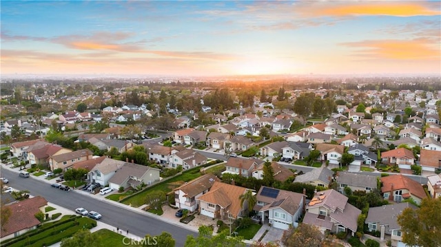 19 Alameda, Irvine, CA 92620 - aerial view at dusk with a residential view