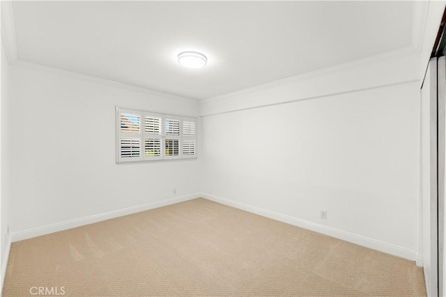 19 Alameda, Irvine, CA 92620 - unfurnished room with baseboards, light colored carpet, and crown molding
