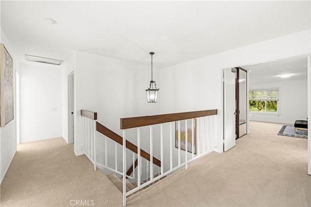 19 Alameda, Irvine, CA 92620 - hall with baseboards, carpet flooring, and an upstairs landing