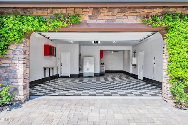 garage featuring freestanding refrigerator