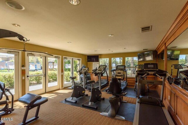 gym with french doors, carpet, visible vents, and recessed lighting