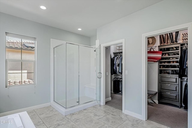 unfurnished bedroom featuring recessed lighting, baseboards, and two closets