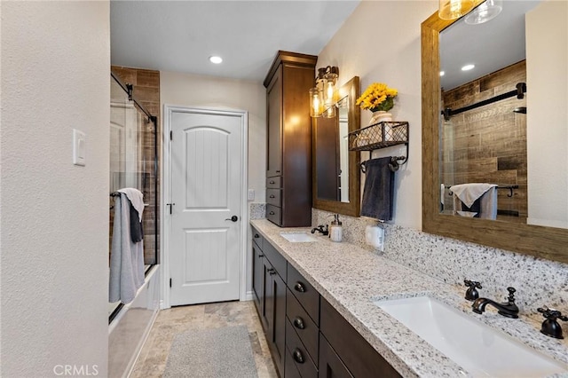 5303 Avondale Way, Riverside, CA 92506 - bathroom featuring double vanity, a sink, and recessed lighting