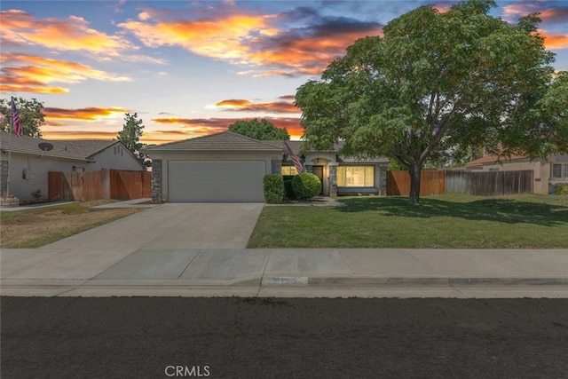 29129 Crestline Dr, Menifee, CA 92584 - view of front of house featuring a garage, driveway, and stucco siding