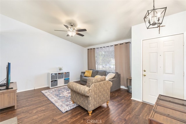 29129 Crestline Dr, Menifee, CA 92584 - living room featuring a chandelier, a ceiling fan, dark wood-style flooring, baseboards, and lofted ceiling