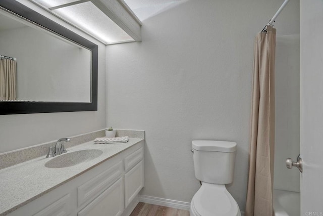 321 N Melrose Dr Unit A, Vista, CA 92083 - bathroom with toilet, curtained shower, vanity, and wood finished floors
