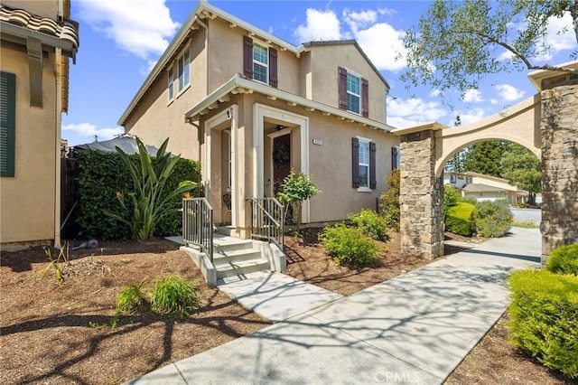 view of front of property featuring stucco siding