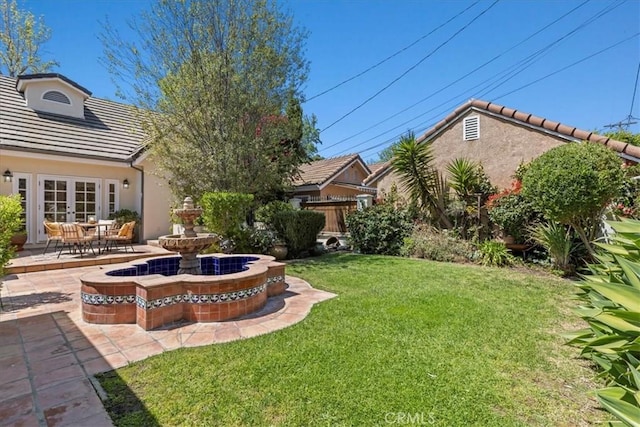 2824 Westwood Blvd, Los Angeles, CA 90064 - view of yard featuring a patio and french doors