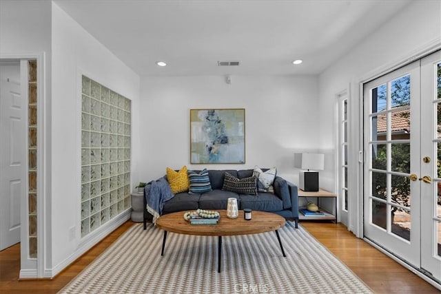2824 Westwood Blvd, Los Angeles, CA 90064 - living room with recessed lighting, visible vents, french doors, and wood finished floors