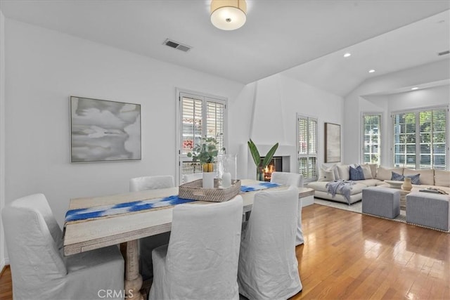 2824 Westwood Blvd, Los Angeles, CA 90064 - dining area with wood finished floors, lofted ceiling, visible vents, and recessed lighting