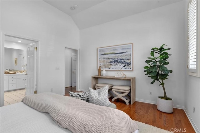 2824 Westwood Blvd, Los Angeles, CA 90064 - bedroom featuring high vaulted ceiling, light wood-type flooring, multiple windows, and baseboards