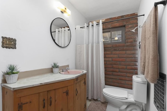 2483 Buckman Springs Rd, Campo, CA 91906 - bathroom featuring toilet, rustic walls, vanity, and a shower with curtain